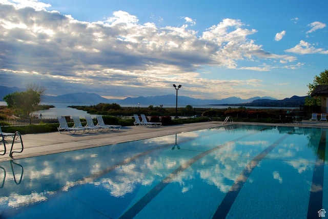 238 N Vista Ct, Saratoga Springs, UT 84045 - community pool featuring a mountain view and a patio area