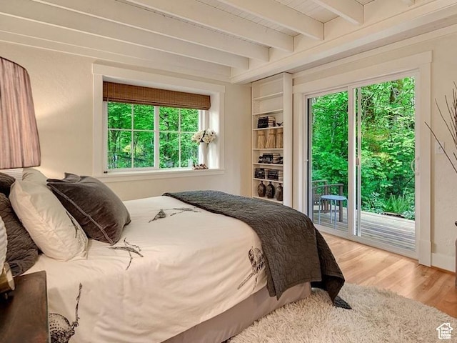 247 W 200 S, Santaquin, UT 84655 - bedroom with access to outside, beam ceiling, and wood finished floors
