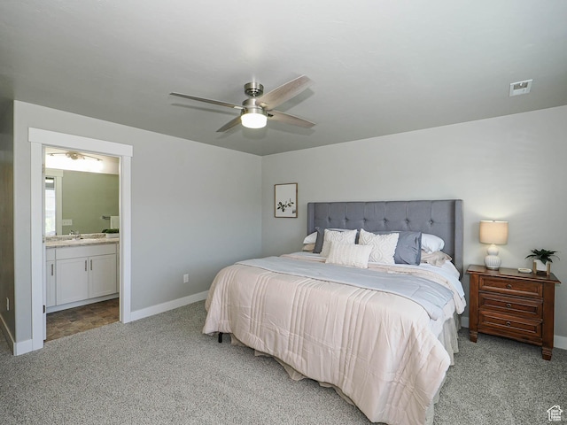 5229 W Armada Way, Herriman, UT 84096 - bedroom with light colored carpet, ensuite bath, and ceiling fan