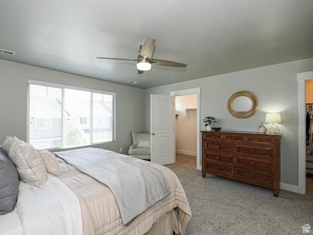 5229 W Armada Way, Herriman, UT 84096 - bedroom with a walk in closet, carpet, and a ceiling fan