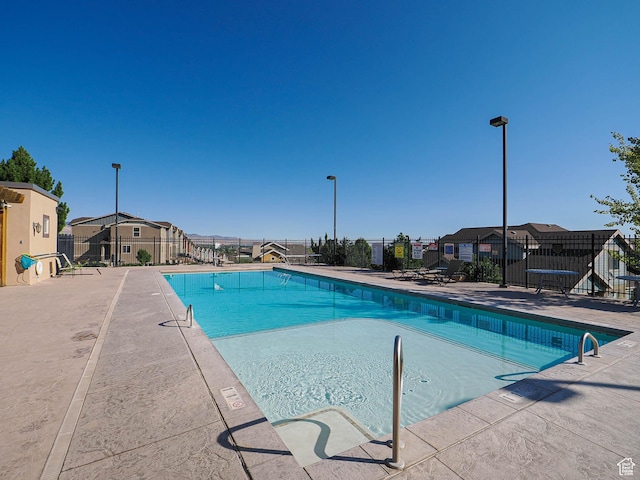 5229 W Armada Way, Herriman, UT 84096 - community pool with a patio and a residential view