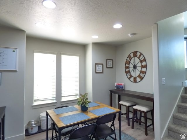 375 W Park Vw S, Spanish Fork, UT 84660 - dining area featuring wood finished floors, healthy amount of natural light, stairway, a textured ceiling, and recessed lighting