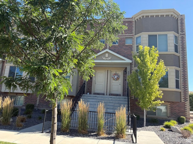 375 W Park Vw S, Spanish Fork, UT 84660 - view of front of house featuring brick siding and stucco siding