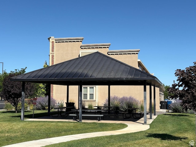 375 W Park Vw S, Spanish Fork, UT 84660 - back of property with a standing seam roof, a lawn, a patio, and stucco siding