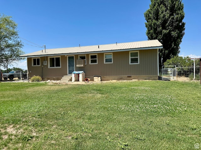 8744 E 6500 S, Jensen, UT 84035 - back of property featuring crawl space and a metal roof