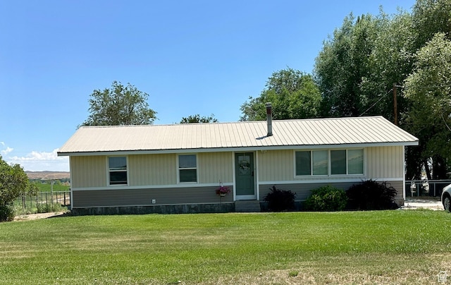 8744 E 6500 S, Jensen, UT 84035 - manufactured / mobile home with a metal roof and entry steps