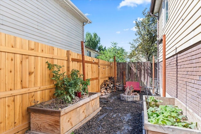 4706 W Roundtable Rd S, West Valley City, UT 84120 - fenced backyard featuring a vegetable garden