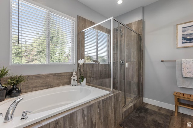 406 Zachary Way, Grantsville, UT 84029 - full bathroom featuring a stall shower, a garden tub, and wood finished floors