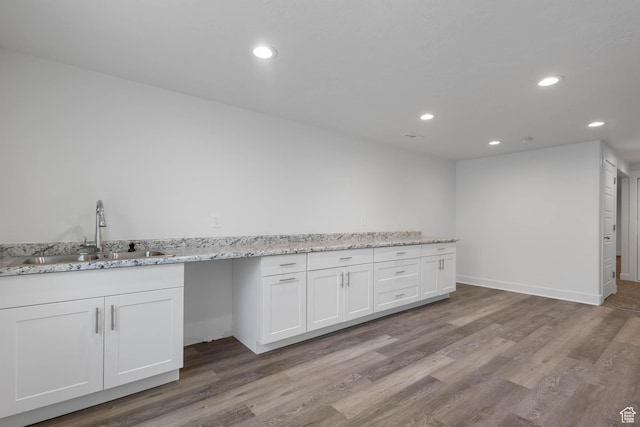 406 Zachary Way, Grantsville, UT 84029 - kitchen with white cabinetry, light wood finished floors, recessed lighting, and light stone counters