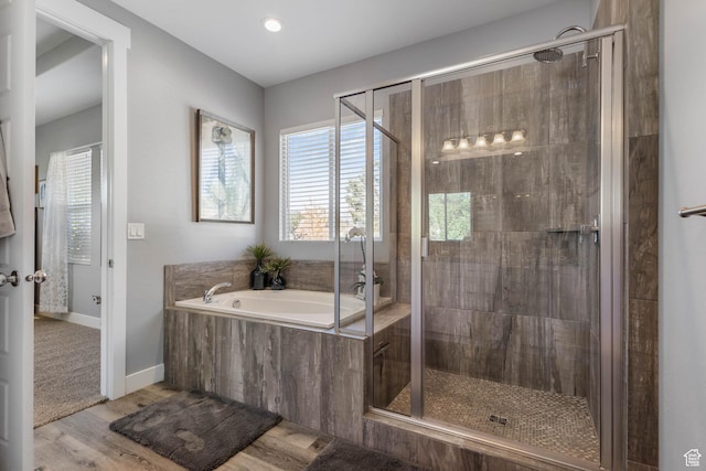 406 Zachary Way, Grantsville, UT 84029 - bathroom with a bath, a shower stall, wood finished floors, and recessed lighting