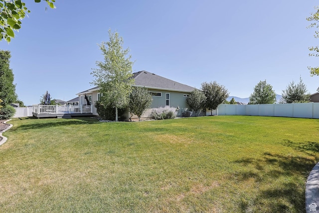 406 Zachary Way, Grantsville, UT 84029 - fenced backyard with a deck