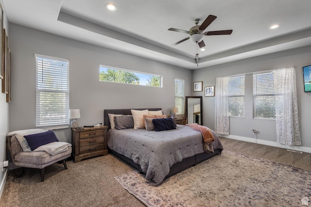 406 Zachary Way, Grantsville, UT 84029 - bedroom with carpet, a raised ceiling, multiple windows, recessed lighting, and a ceiling fan