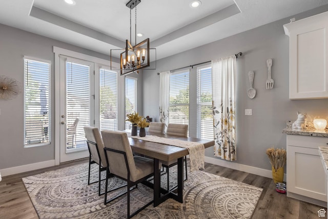 406 Zachary Way, Grantsville, UT 84029 - dining room featuring a chandelier, recessed lighting, a tray ceiling, and wood finished floors