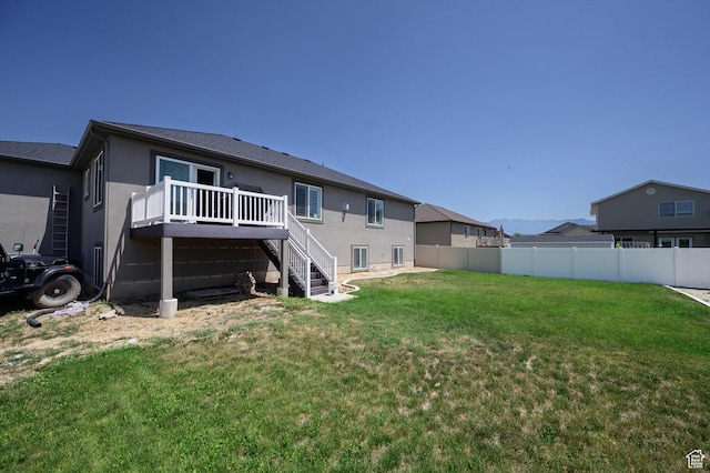 4449 W 5325 S, Hooper, UT 84315 - rear view of property with stairs, a wooden deck, and stucco siding