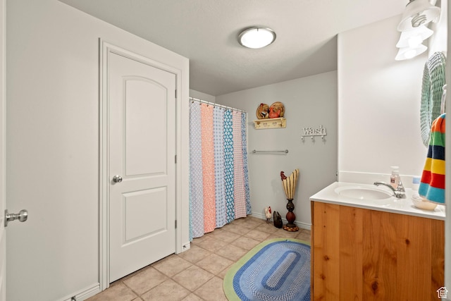 135 W Cove Dr, Elk Ridge, UT 84651 - bathroom featuring tile patterned floors, vanity, and a shower with curtain