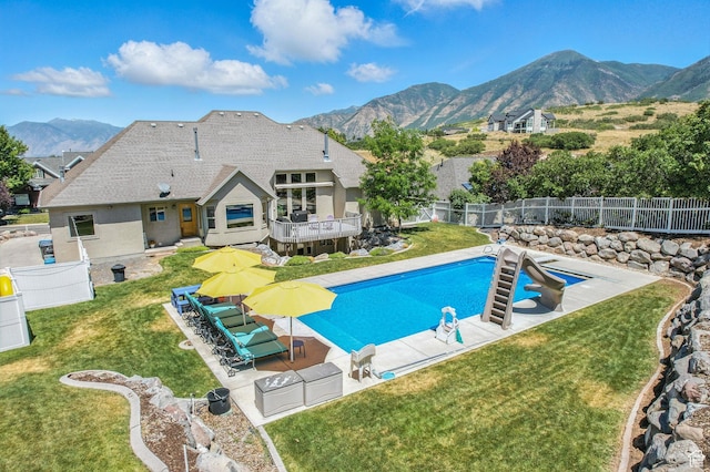 135 W Cove Dr, Elk Ridge, UT 84651 - view of swimming pool with a mountain view, a fenced backyard, and a patio