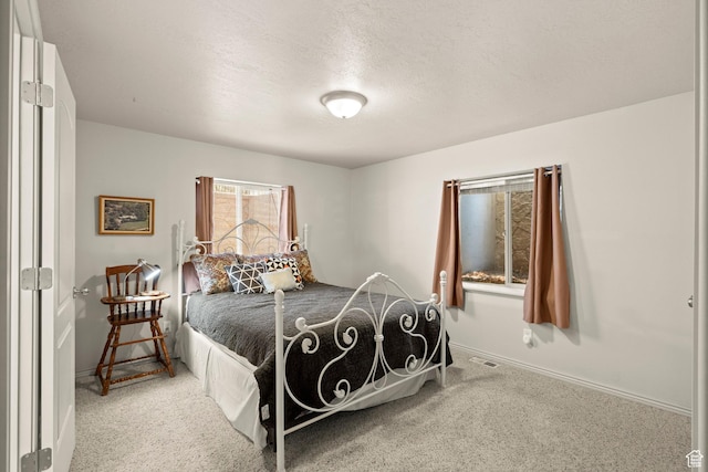 135 W Cove Dr, Elk Ridge, UT 84651 - carpeted bedroom with baseboards and a textured ceiling
