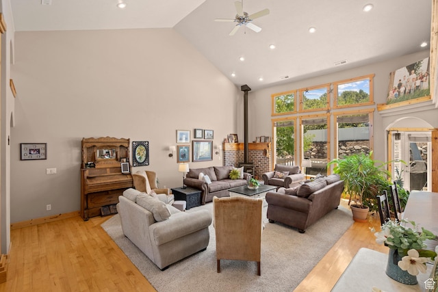 135 W Cove Dr, Elk Ridge, UT 84651 - living area featuring high vaulted ceiling, light wood-type flooring, a wood stove, recessed lighting, and ceiling fan