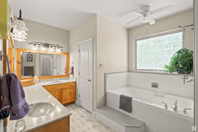 135 W Cove Dr, Elk Ridge, UT 84651 - bathroom featuring vanity, a bath, and a ceiling fan