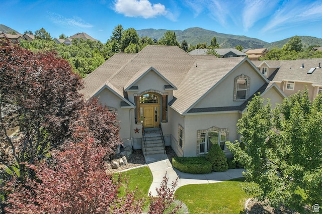 135 W Cove Dr, Elk Ridge, UT 84651 - french country style house featuring stucco siding, a mountain view, and roof with shingles
