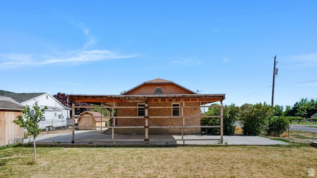 403 E Center, Nephi, UT 84648 - back of house featuring a storage unit