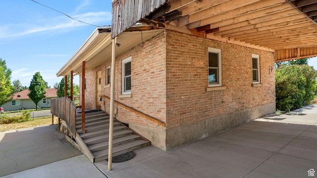 403 E Center, Nephi, UT 84648 - view of side of property featuring brick siding and a patio