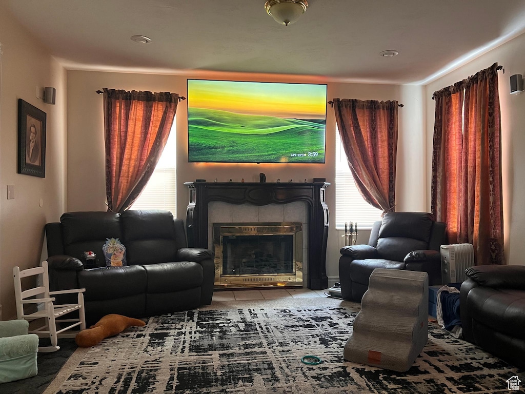 1463 W 730 S, Orem, UT 84058 - living room featuring healthy amount of natural light, a tiled fireplace, and tile patterned flooring