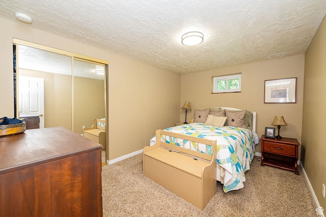 2127 E 5950 N, Liberty, UT 84310 - bedroom featuring carpet floors, a textured ceiling, and a closet
