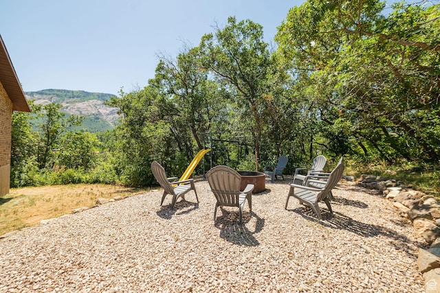 2127 E 5950 N, Liberty, UT 84310 - view of patio with a fire pit and a mountain view