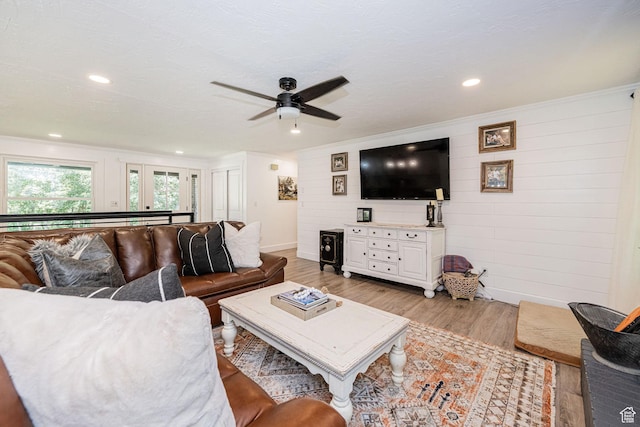 2127 E 5950 N, Liberty, UT 84310 - living area featuring light wood-type flooring, a ceiling fan, wood walls, recessed lighting, and crown molding