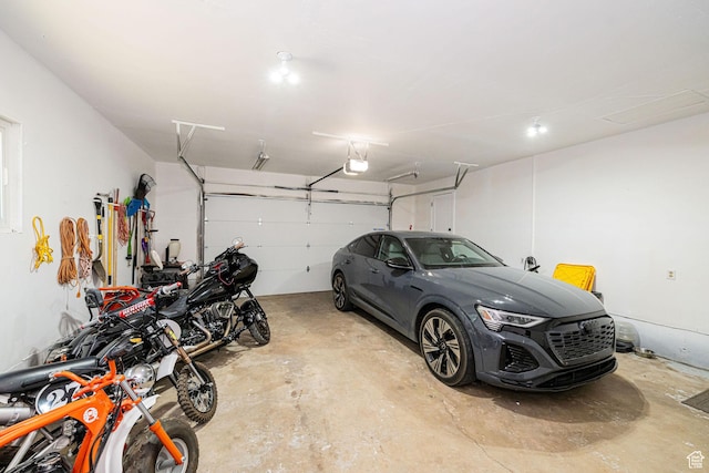 2127 E 5950 N, Liberty, UT 84310 - garage featuring a garage door opener