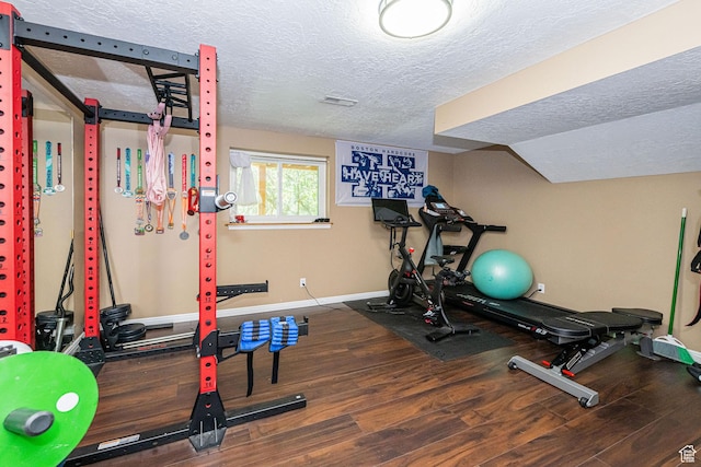 2127 E 5950 N, Liberty, UT 84310 - workout area featuring wood finished floors and a textured ceiling