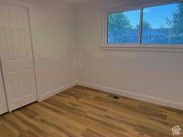 1456 E 5935 S, Murray, UT 84121 - empty room featuring wood finished floors