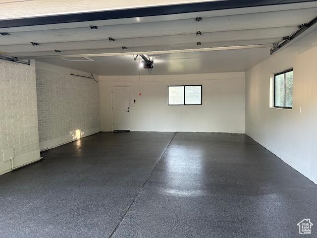 1456 E 5935 S, Murray, UT 84121 - garage featuring a garage door opener