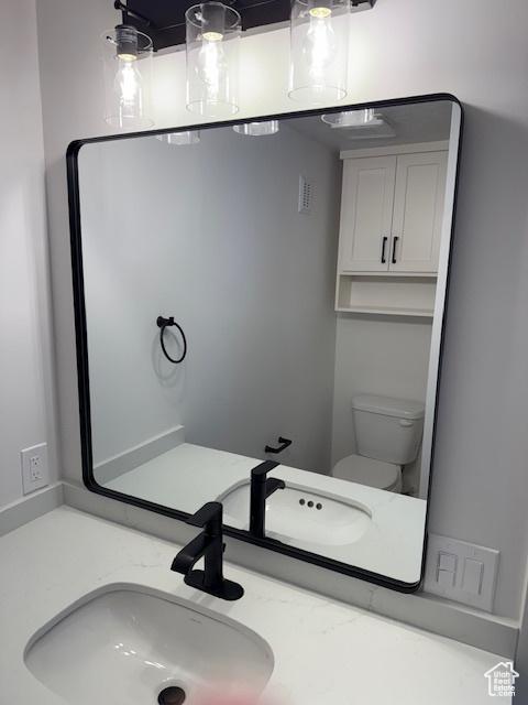 1456 E 5935 S, Murray, UT 84121 - bathroom featuring toilet and vanity