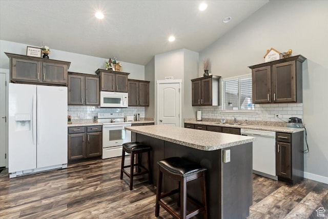 6533 W Elena St S, West Valley City, UT 84128 - kitchen featuring white appliances, dark brown cabinets, a center island, dark wood-style floors, and recessed lighting