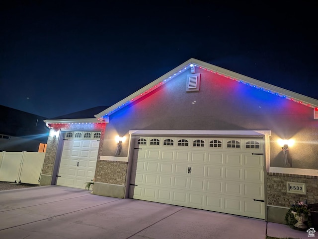 6533 W Elena St S, West Valley City, UT 84128 - ranch-style house featuring driveway and an attached garage