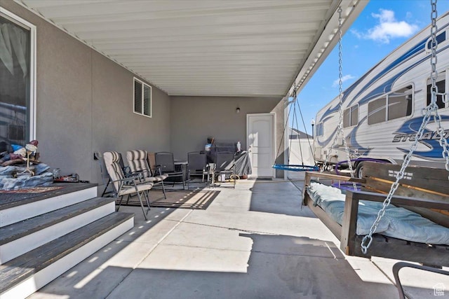 6533 W Elena St S, West Valley City, UT 84128 - view of patio / terrace featuring a trampoline