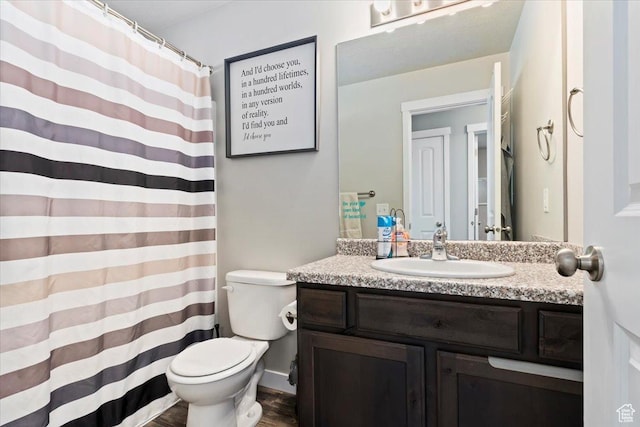 6533 W Elena St S, West Valley City, UT 84128 - full bath featuring vanity and wood finished floors