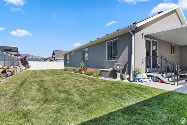 6533 W Elena St S, West Valley City, UT 84128 - view of yard featuring a patio