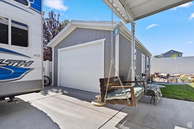 6533 W Elena St S, West Valley City, UT 84128 - garage featuring concrete driveway