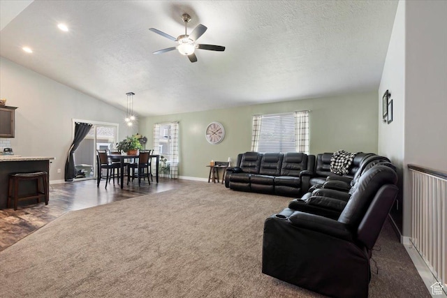 6533 W Elena St S, West Valley City, UT 84128 - carpeted living room with a textured ceiling, a ceiling fan, lofted ceiling, and recessed lighting
