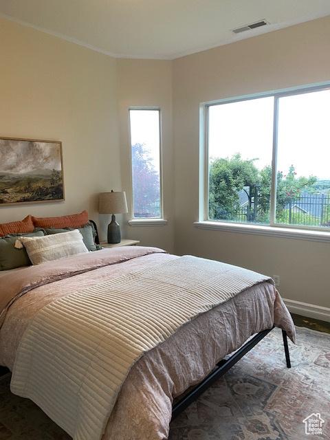 9061 N Canyon Dr, Cedar Hills, UT 84062 - bedroom with wood finished floors and baseboards