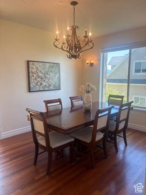 9061 N Canyon Dr, Cedar Hills, UT 84062 - dining space with a chandelier and dark wood-style floors