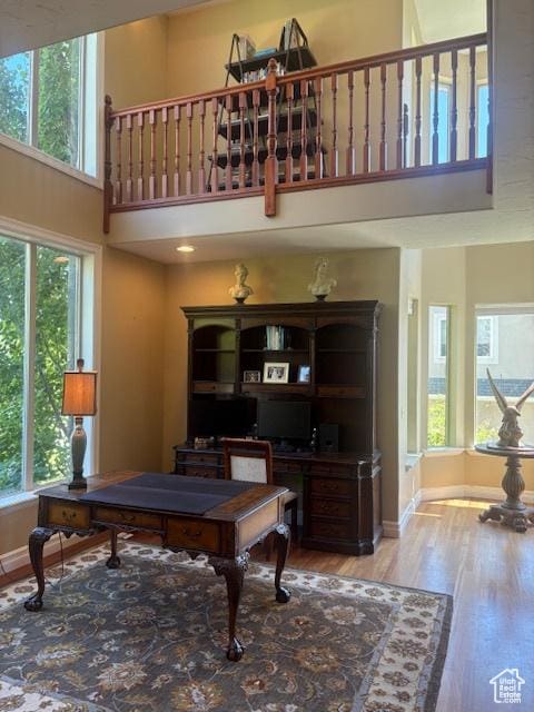 9061 N Canyon Dr, Cedar Hills, UT 84062 - office space with a high ceiling and wood finished floors