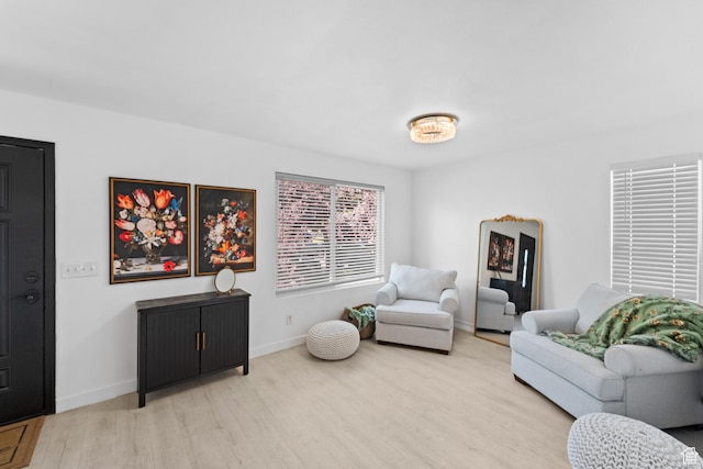 25 E 1860 N, Tooele, UT 84074 - living area featuring light wood-type flooring and baseboards