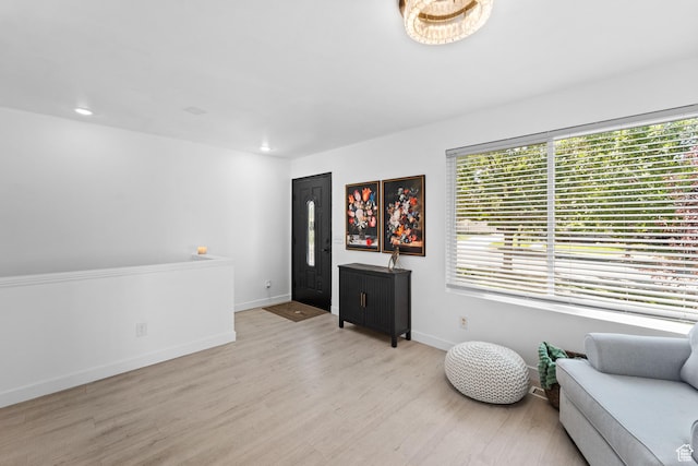 25 E 1860 N, Tooele, UT 84074 - living area featuring light wood-style floors and recessed lighting