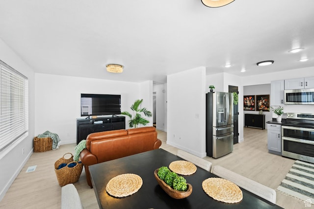 25 E 1860 N, Tooele, UT 84074 - dining area with light wood-style floors