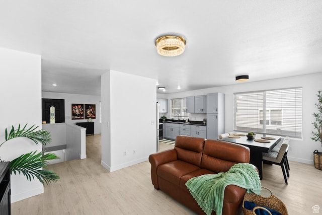 25 E 1860 N, Tooele, UT 84074 - living area featuring light wood-type flooring and recessed lighting