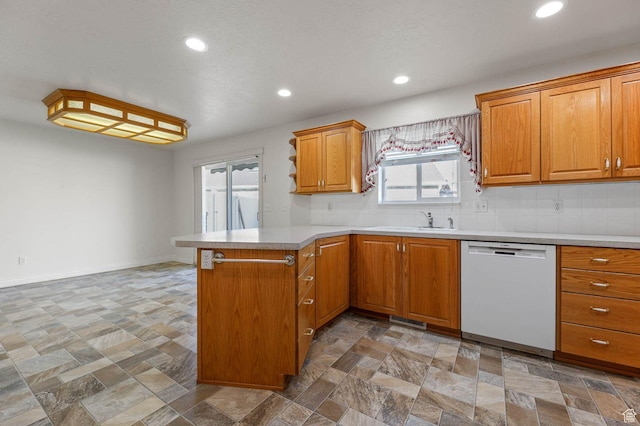 2474 N Dorchester Ave, Harrisville, UT 84414 - kitchen with dishwasher, a peninsula, recessed lighting, and light stone finish flooring